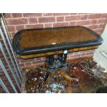 A Victorian walnut and inlaid ebony folding top card table with Wedgwood panel