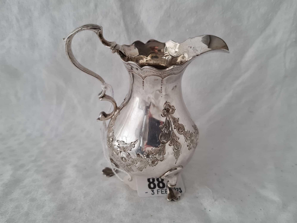 A George III Cream jug on three pad feet, 4" high, London 1748? By SM - Image 2 of 2