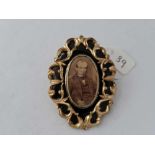 Victorian memorial brooch with black enamel and a centre portrait of a Victorian Gentleman, 62 x