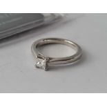 SINGLE STONE PLATINUM SQUARE DIAMOND RING WITH ANCHOR CERT STATING:E colour, Si clarity, weight 0.