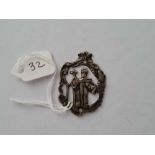 Antique silver pendant with a Papal figure