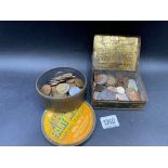 Two tins of coins