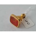 Antique Victorian gold cased seal, set with a carnelian with an intaglio of a beehive and bees and a