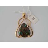 An opal triangular doublet pendant in 9ct