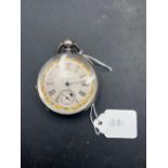 Gents silver pocket watch with fancy silver face and seconds dial