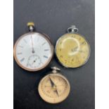 Two watches and a compass