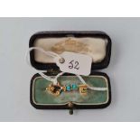 A Georgian high carat gold turquoise set boxed key brooch