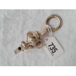 An embossed baluster shaped rattle /whistle with teething ring (unmarked)