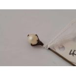 Vintage eagle claw clutching a real pearl stickpin