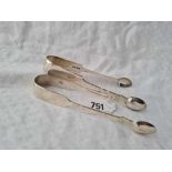 A pair of fiddle pattern Exeter sugar tongs 1851 by JS and another pair, London 1850, 85g