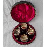 A boxed set of four Victorian salts and spoons with gilded bowls, Birmingham 1894