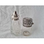 A silver mounted caster and an embossed salts bottle with stopper, Birmingham 1904