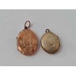 A 9ct b & f locket and another