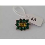 A early Georgian green and yellow foil back memorial brooch in high carat gold in good condition