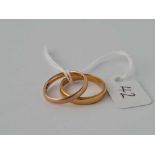 A 22ct gold wedding band size L 3.4 gms together with a 9ct wedding band size K 1.5 gms