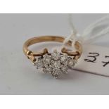 A fancy bright diamond cluster ring 18ct gold size H 2 gms