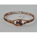 A EDWARDIAN AMETHYST AND PEARL SET CLOVER LEAF BANGLE 9CT 14GMS