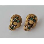 A pair of green stone earrings 15ct gold 4.6 gms