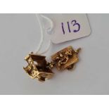 A unusual barrel organ charm with monkey 9ct 3.7 gms