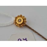 A gold and diamond stick pin 15ct gold 1.6 gms