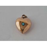 Antique Victorian rolled gold heart pendant set with a turquoise