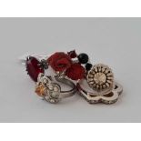 Five good silver stone set rings