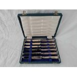 A set of six silver handled tea knives fitted case