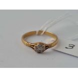 A diamond cluster ring 18ct gold size Q 2.1 gms