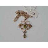 A peridot and pearl pendant on chain 9ct 18 inch 3.4 gms