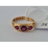 A EDWARDIAN THREE STONE RUBY AND DIAMOND RING CHESTER 1902 18CT GOLD SIZE R 4.6 GMS