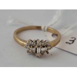 A baguette diamond ring with bright white stones 9ct size M 1.7 gms