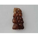 A Chinese carved squirrel brown jade pendant 6 cm long 33g