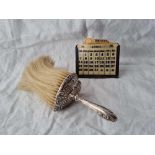 A crumb brush with silver mounts and a calendar