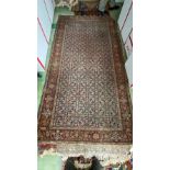Small Antique blue ground carpet 9'8in x 5'
