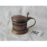 A small circular mustard pot with pierced sides, Birmingham 1924 with B.G.L