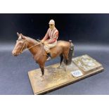 Unusual metal painted table lighter with horse and jockey and stubbing pad