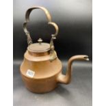 A old copper kettle with swing handle 13 inches high