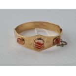 A vintage Excalibur rolled gold agate set bangle