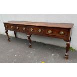 18thC Oak dresser base with drawers to frieze standing on carved cabriolet legs and claw and ball
