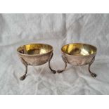 A pair of 19th Century Italian salts with hemispherical gilt bowls and pad feet, 157g