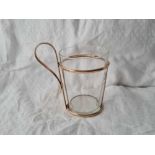 A cup holder with loop handle and plain glass liner, Birmingham 1906 by JCV, 97g net
