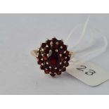 9ct oval garnet cluster ring, size N