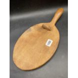 A Thompson of Ambleside oak cheese board with mouse 14 and a half inches long