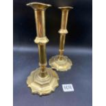 A pair of 18th century brass candlesticks with shaped base 8 inch high