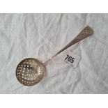 A Georgian sifter spoon with engraved decoration, London 1792 by SG, EW