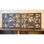 Pair of carved and pierced Oriental pictures 23in x 30in