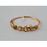 A VICTORIAN CITRINE SET BANGLE IN BOX 15CT GOLD TESTED 12 GMS