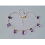 A Victorian amethyst and real seed pearl necklace with gold clasp