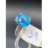 Bright Brazilian blue Topaz and Diamond ring in fancy setting 18ct Size M