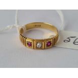 AN EDWARDIAN RUBY AND DIAMOND GYPSY SET RING, 18ct, size O, 2.9 g.